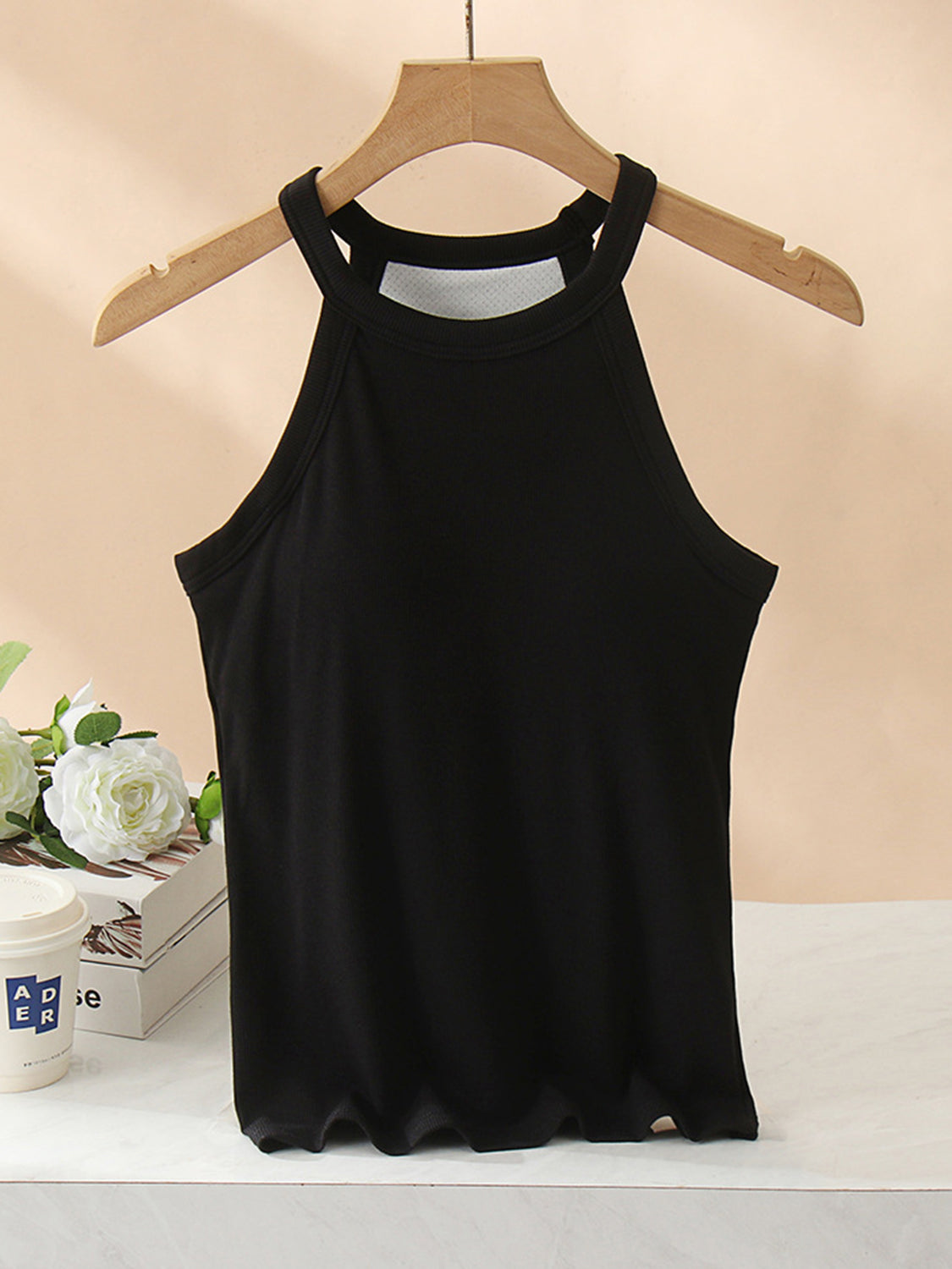 Black ribbed halter tank top with built-in bra detail