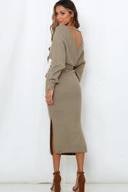 Khaki wrap-front midi knit dress with a belted waist and side slit.