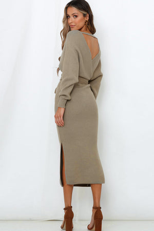 Khaki wrap-front midi knit dress with a belted waist and side slit.