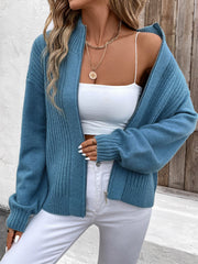 French Blue ribbed acrylic zip-up sweater with a stand-up collar and full zip closure.