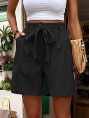 Black linen bermuda shorts with pleated front and tie waist detail