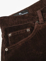 Brown corduroy wide-leg joggers with button fly and silver rivets on pockets.