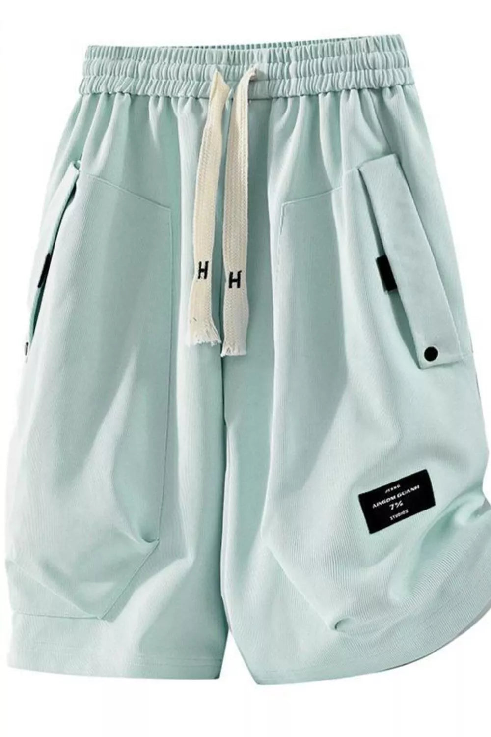 Sage relaxed fit drawstring chino shorts with pockets and a black logo tag.