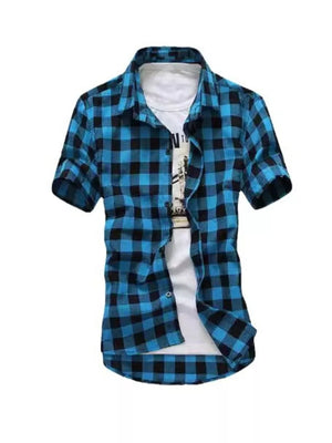 Men's short sleeve button-down shirt in Lake Blue buffalo check, worn over a white t-shirt.
