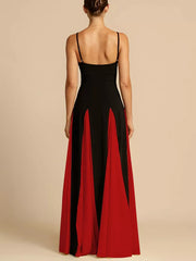 Elegant black and red maxi dress with spaghetti straps and a flowing skirt.