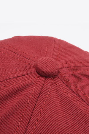 Deep Red baseball cap with stitched panel detail and button top.