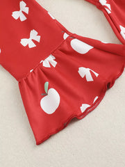 Red cotton bodysuit with white apple and bow print, ruffled bell sleeves.
