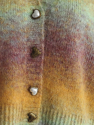 Ombre knit cardigan with heart buttons and textured acrylic blend.