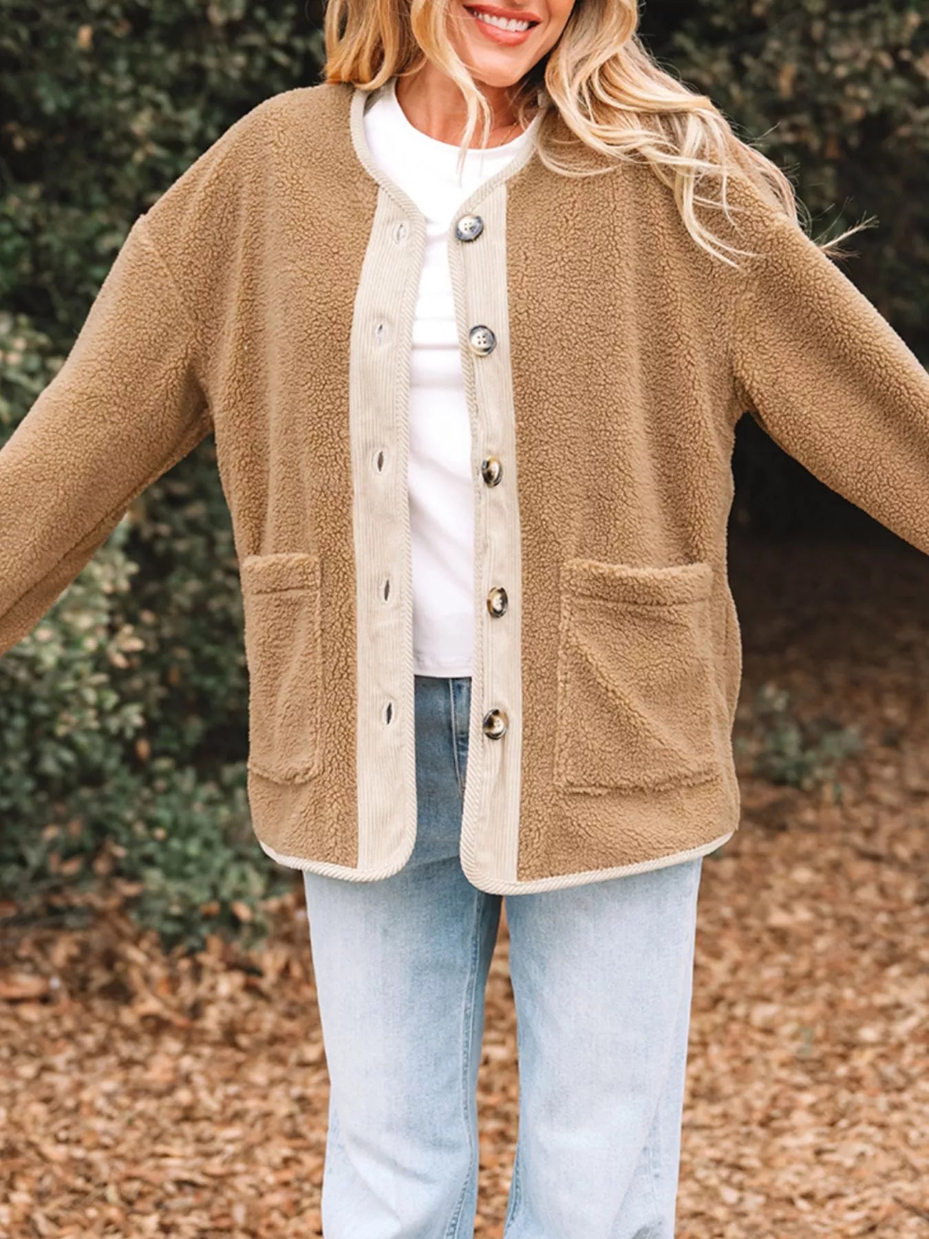 Plush corduroy patchwork jacket in camel with button front and patch pockets.
