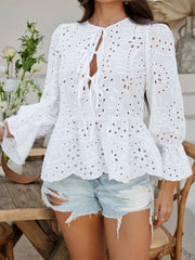 White eyelet peplum blouse with tie neck and bell sleeves
