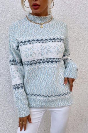 Nordic Fair Isle mock neck knit sweater in Cloudy Blue with snowflake pattern and acrylic blend.