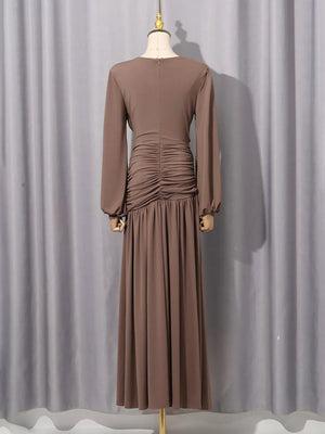 Ruched Long-sleeve Maxi Dress With Cutout in Brown, model styling view