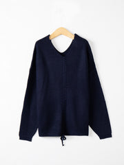 Dark Blue slouchy knit sweater with V-neck and lace-up detail at hem