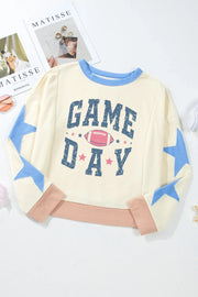 Ivory cotton sweatshirt with blue star sleeves and "GAME DAY" graphic.