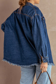 Oversized dark blue denim shirt jacket with frayed hem and buttoned cuffs.