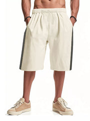 Apricot men's bermuda shorts with drawstring waist and side stripe detail.