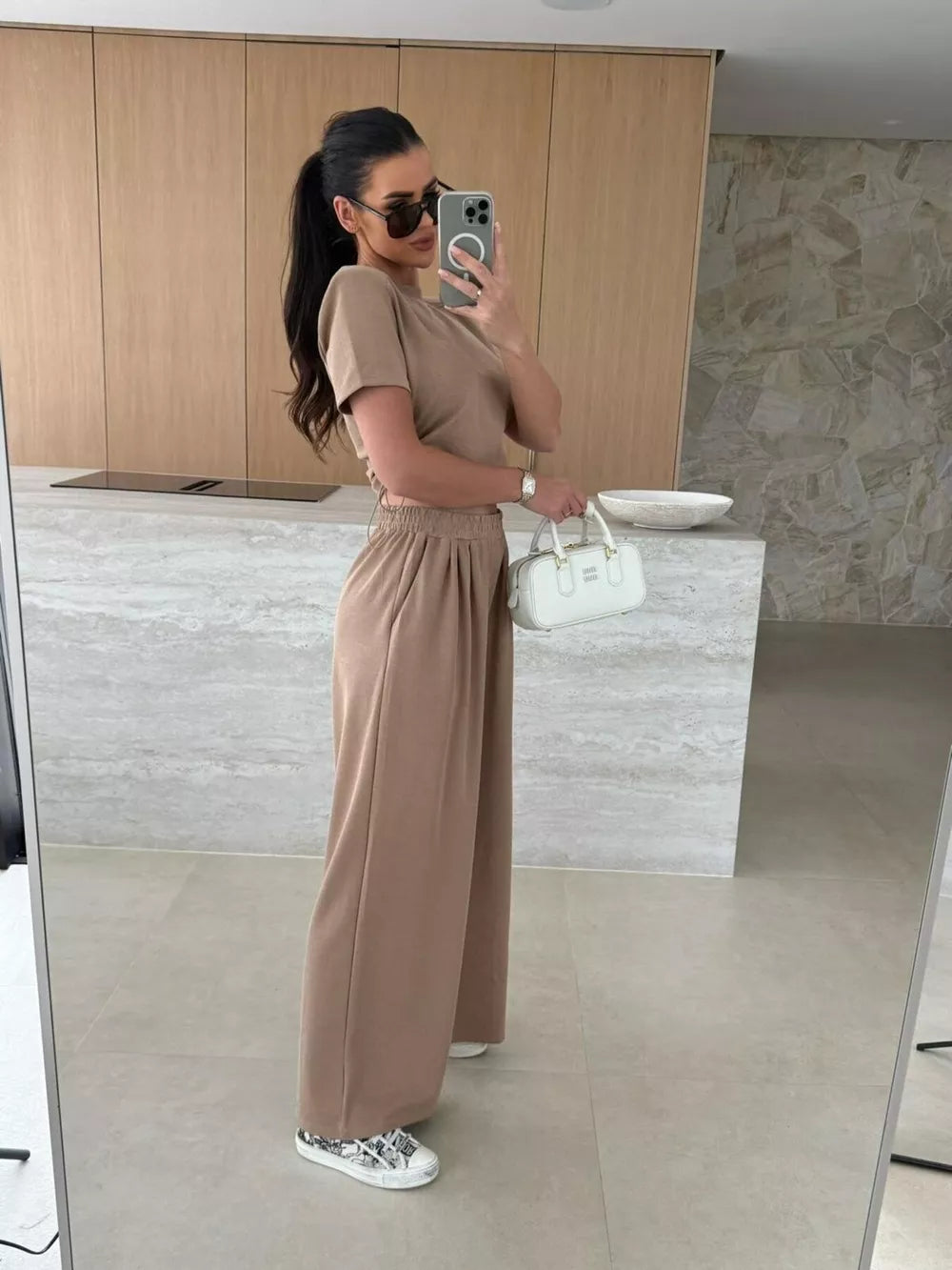 Mocha crop top and wide-leg pants set with drawstring waist.