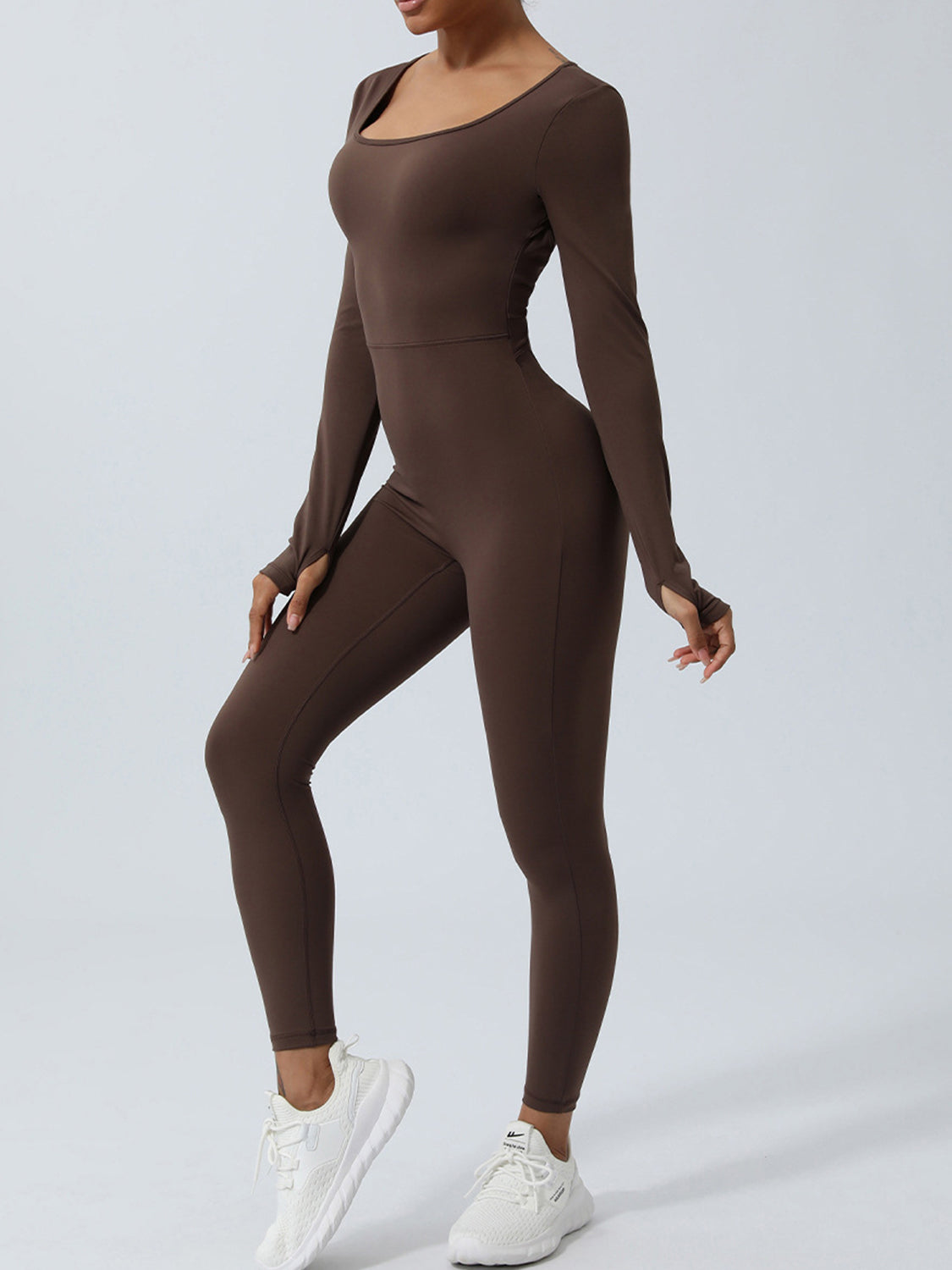 Chocolate long sleeve sculpting jumpsuit with thumbholes and a square neckline.