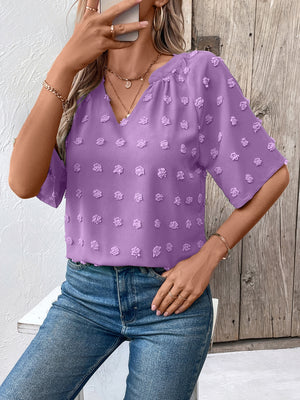 Heliotrope purple Swiss dot blouse with V-neck and short sleeves