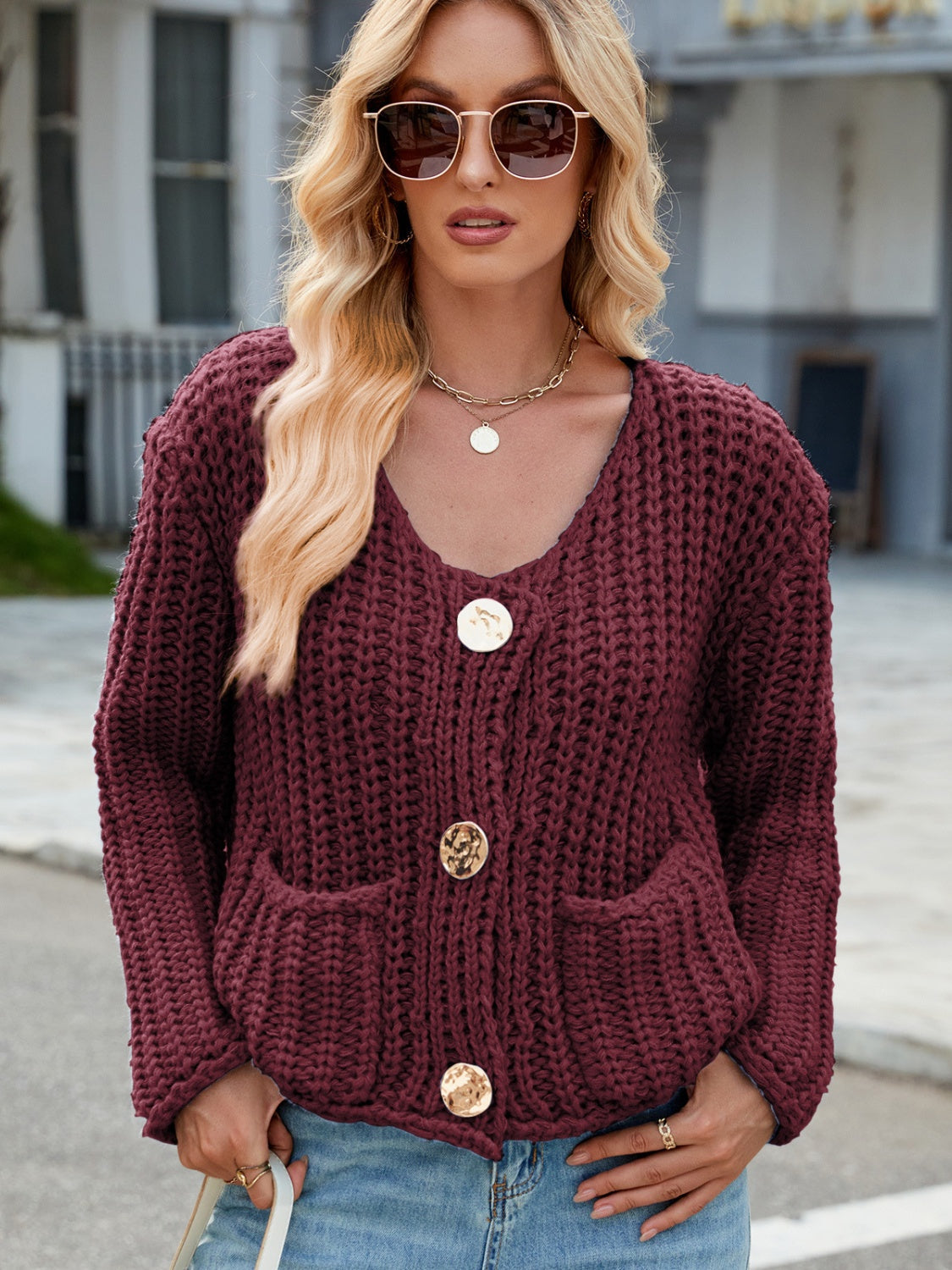 Burgundy chunky knit cardigan with gold buttons and pockets