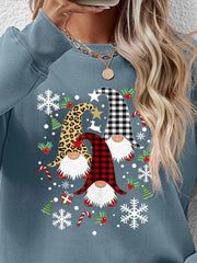 Dusty Blue raglan sweatshirt with festive gnome Christmas graphic, snowflakes, and holly.