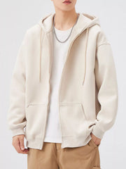 Casual loose fit zip-up hoodie in apricot with drawstring hood and front pockets.
