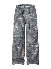 Men's camouflage cargo sweatpants with drawstring waist and multiple pockets.