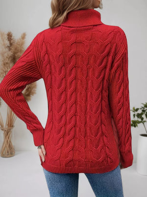 Red cable-knit turtleneck sweater with ribbed cuffs and hem.