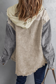 Colorblock corduroy hooded utility jacket in tan and gray with frayed hem.