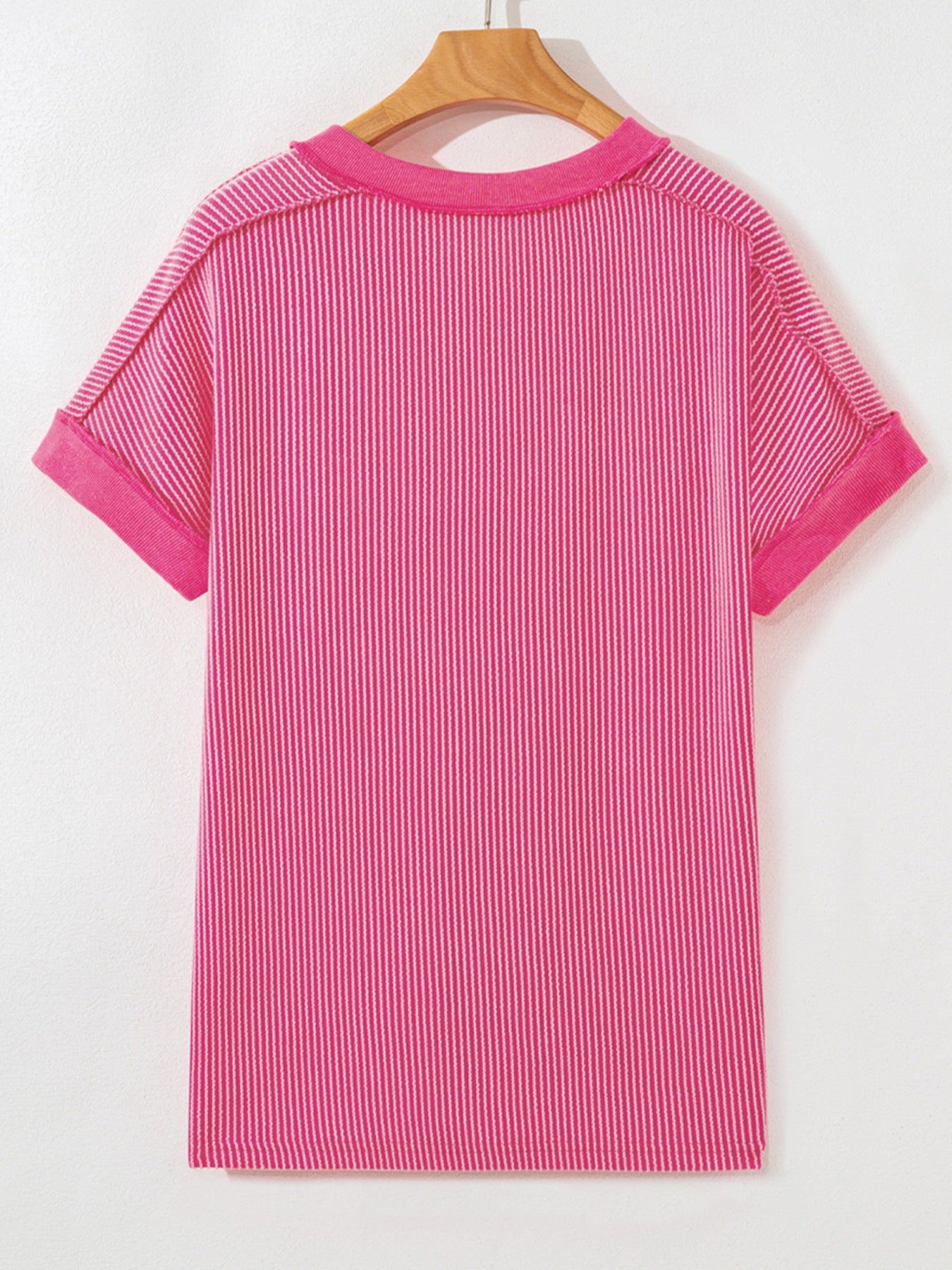 Pink striped tee with cuffed short sleeves and a crew neck.