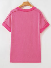 Pink striped tee with cuffed short sleeves and a crew neck.