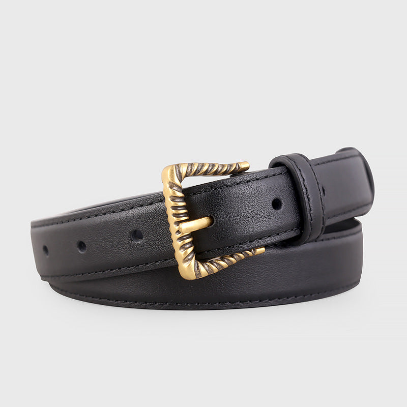 Black leather belt with a textured gold buckle
