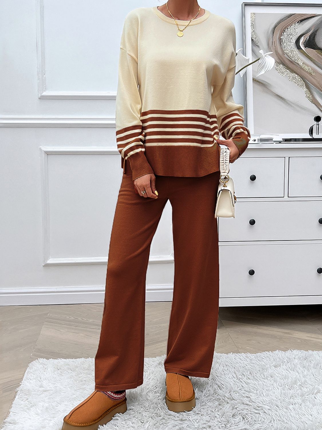 Color-blocked knit lounge set with tan and brown stripes on sweater and brown pants.