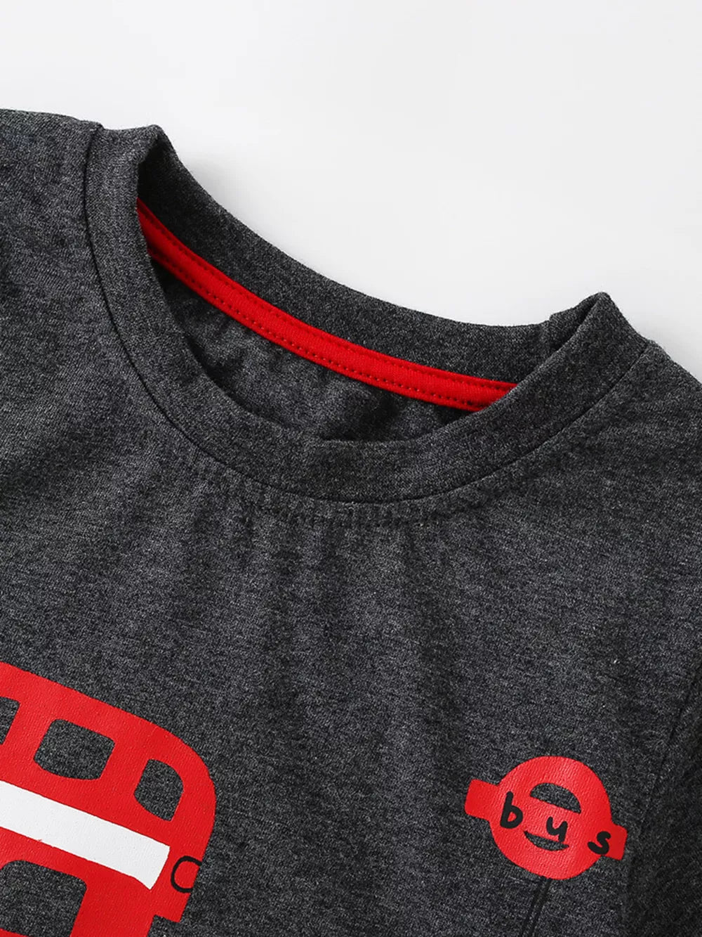 Kids charcoal cotton t-shirt with red bus graphic and red neckline trim.