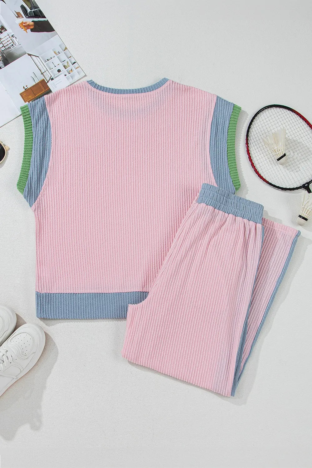 Ribbed blush pink loungewear set with colorblock trim and blue waistband.