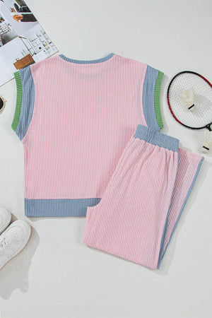 Ribbed blush pink loungewear set with colorblock trim and blue waistband.