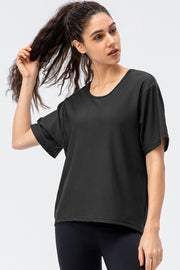 Black honeycomb mesh performance tee with short sleeves and a scoop neckline.