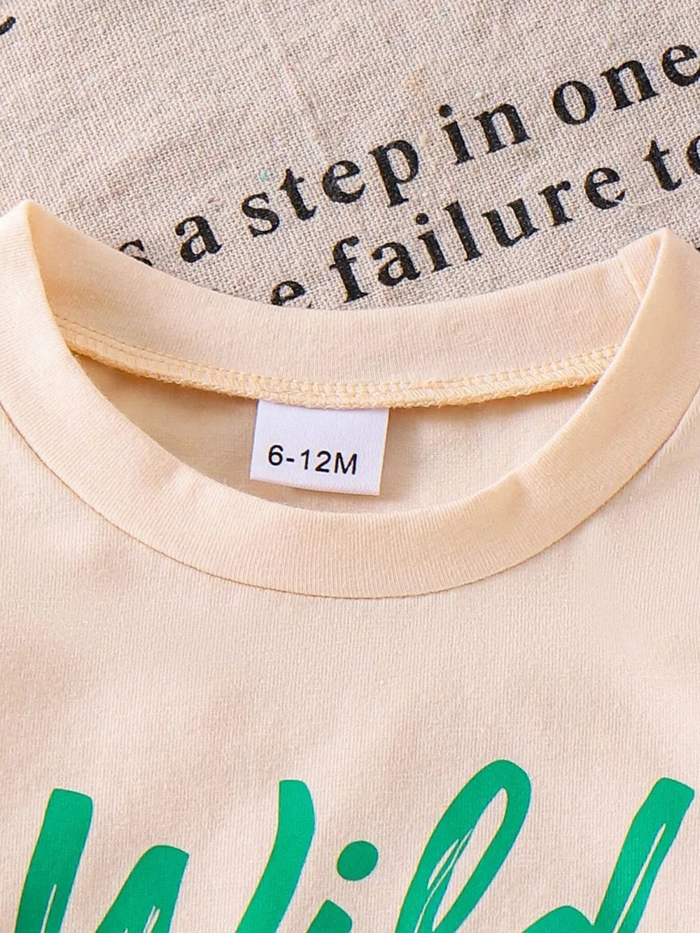 Children S Graphic Round Neck Tee And Shorts in Green, close-up detail