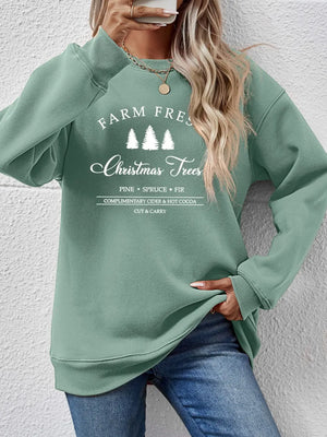 Sage graphic sweatshirt with "Farm Fresh Christmas Trees" print, crewneck, long sleeves.