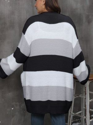 Chunky stripe open-front cocoon cardigan in black, white, and grey acrylic with pockets.