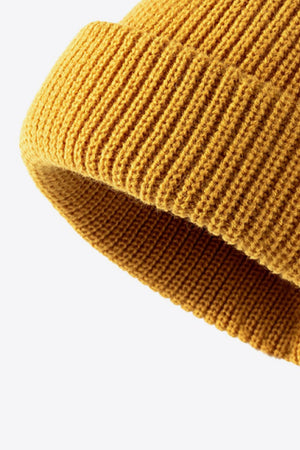 Mustard yellow ribbed knit beanie with folded edge detail