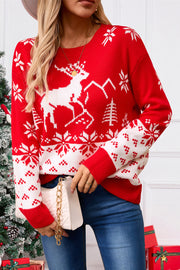 Red acrylic knit sweater with white reindeer, snowflake, and tree Fair Isle pattern.