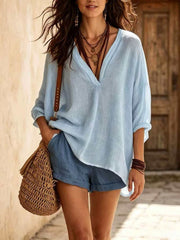 blouse in White with v-neck and tunic-length