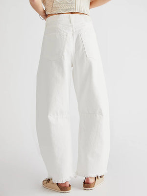 White palazzo jeans with frayed hemline and wide leg