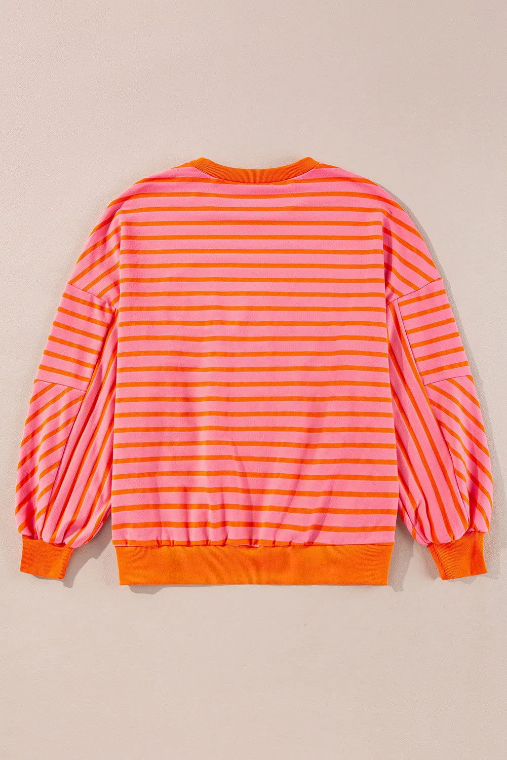 Chevron-Inset Stripe Sweatshirt in pink and orange horizontal stripes with balloon sleeves.
