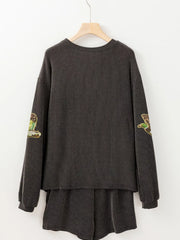Dark gray ribbed loungewear set with sequin patches on sleeves.