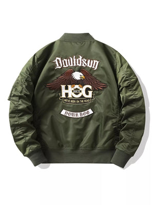 Army green embroidered bomber jacket with eagle and text graphics on back.