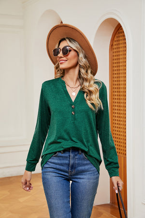 Dark green henley long sleeve top with button detail and v-neck