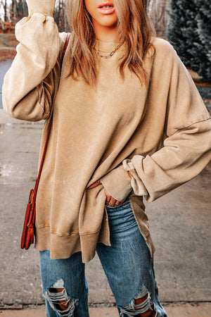 Oversized washed cotton sweatshirt in carnation pink with side slits.
