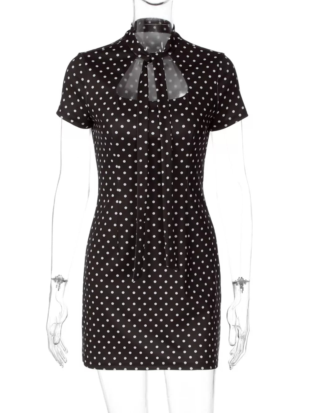 Black polka dot mini dress with short sleeves and a tie-neck cut-out detail.